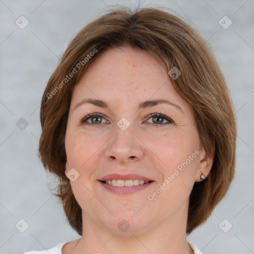 Joyful white adult female with medium  brown hair and brown eyes