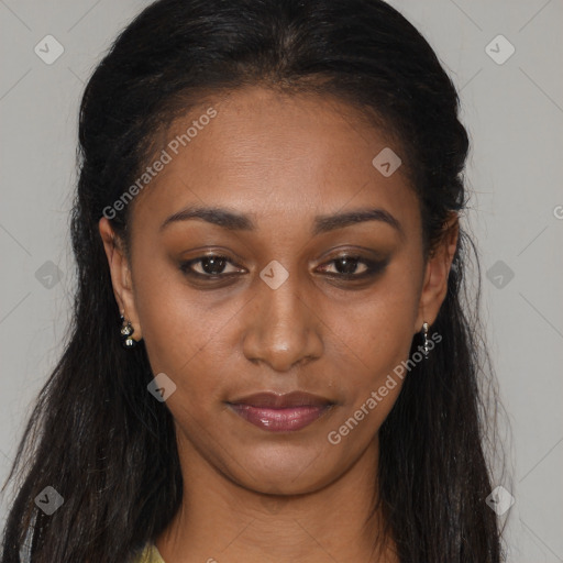 Joyful black young-adult female with long  brown hair and brown eyes