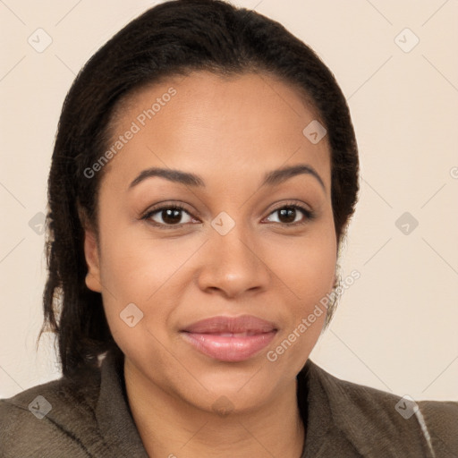 Joyful latino young-adult female with short  brown hair and brown eyes