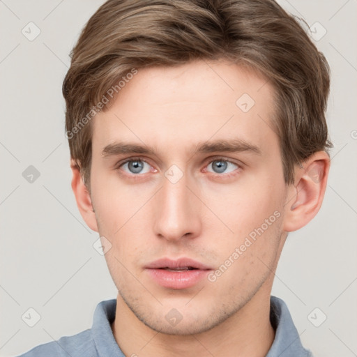 Neutral white young-adult male with short  brown hair and grey eyes