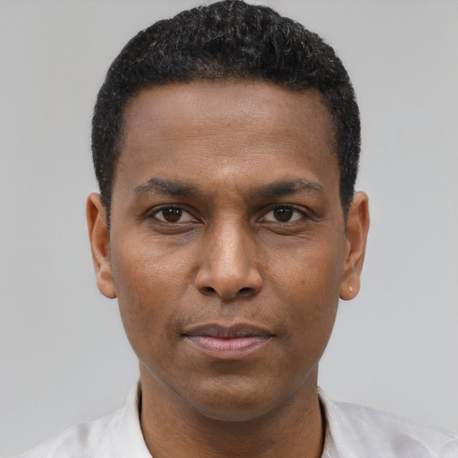 Neutral black young-adult male with short  black hair and brown eyes