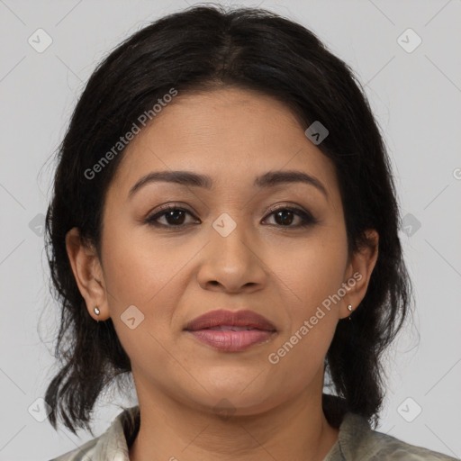 Joyful latino young-adult female with medium  brown hair and brown eyes