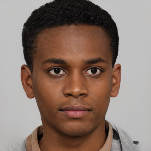 Neutral black young-adult male with short  brown hair and brown eyes