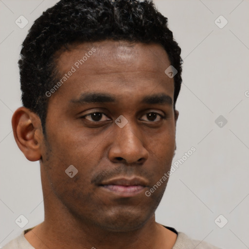 Neutral black young-adult male with short  black hair and brown eyes