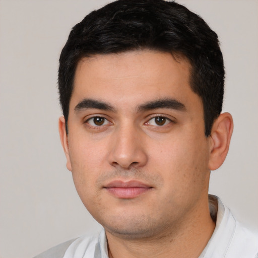 Neutral white young-adult male with short  black hair and brown eyes
