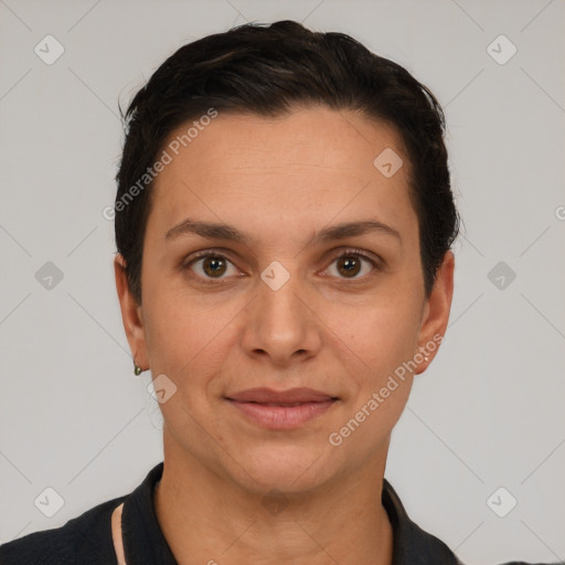 Joyful white young-adult female with short  brown hair and brown eyes