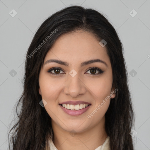 Joyful latino young-adult female with long  brown hair and brown eyes