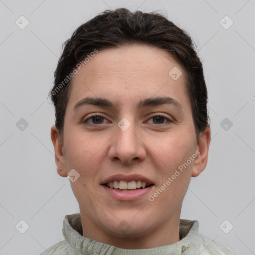 Joyful white young-adult female with short  brown hair and grey eyes