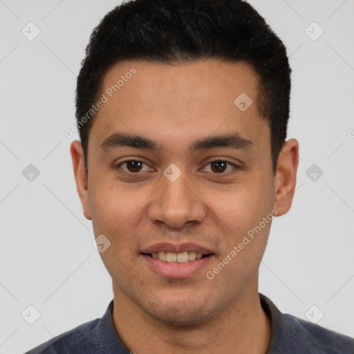 Joyful white young-adult male with short  black hair and brown eyes