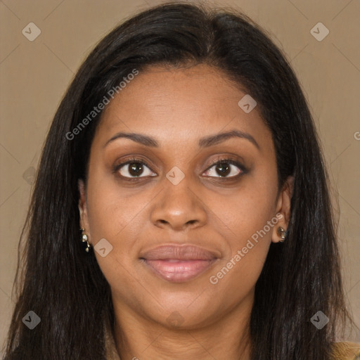 Joyful black young-adult female with long  brown hair and brown eyes