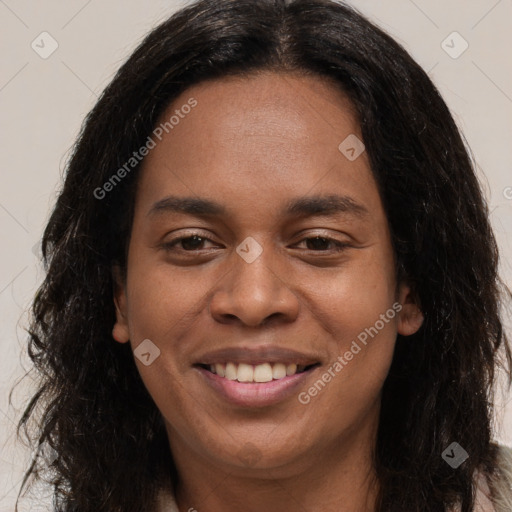 Joyful black young-adult female with long  brown hair and brown eyes