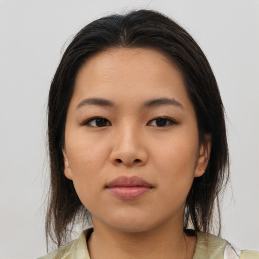 Neutral asian young-adult female with medium  brown hair and brown eyes