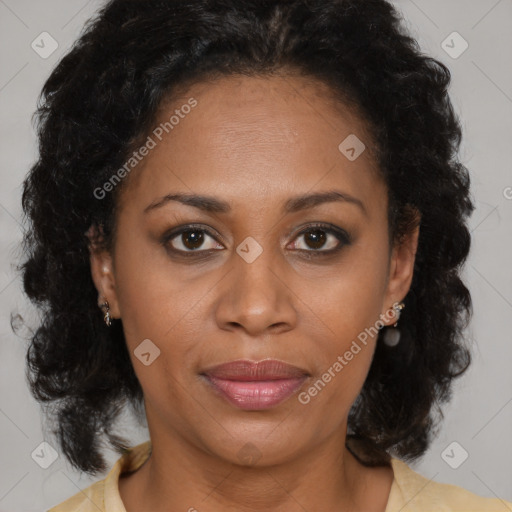 Joyful black young-adult female with medium  brown hair and brown eyes