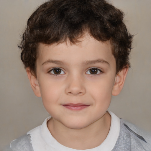 Joyful white child male with short  brown hair and brown eyes