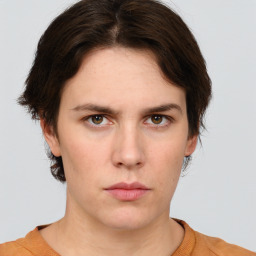 Neutral white young-adult female with short  brown hair and brown eyes