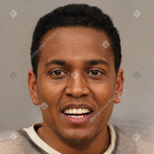 Joyful black young-adult male with short  black hair and brown eyes