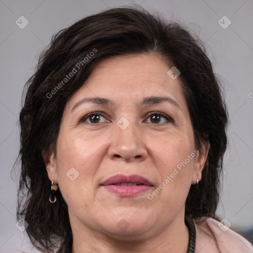 Joyful white adult female with medium  brown hair and brown eyes