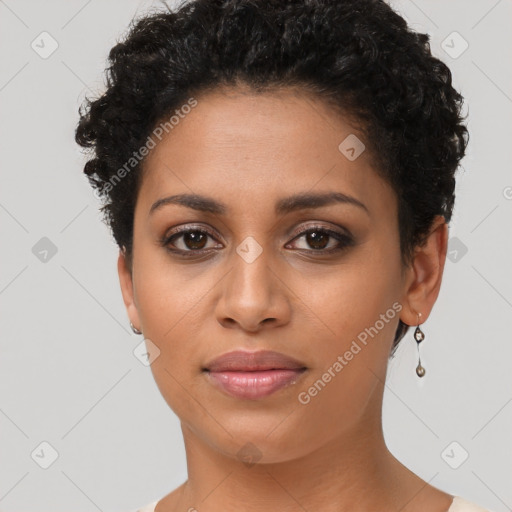 Joyful latino young-adult female with short  brown hair and brown eyes