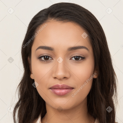 Joyful latino young-adult female with long  brown hair and brown eyes