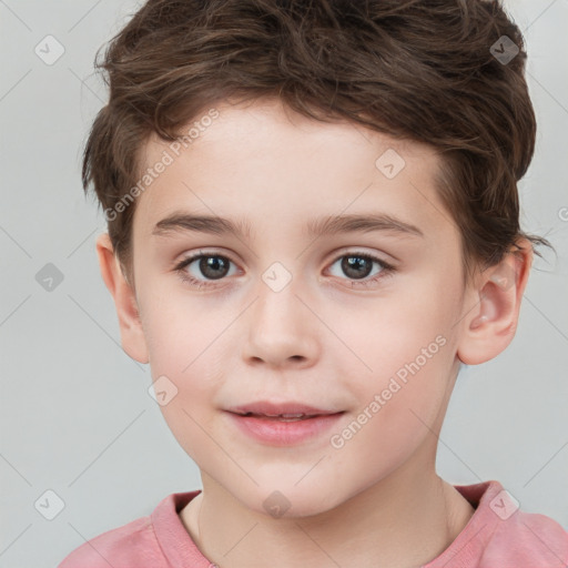 Joyful white child male with short  brown hair and brown eyes