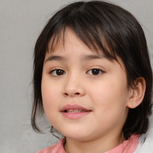 Joyful white child female with medium  brown hair and brown eyes