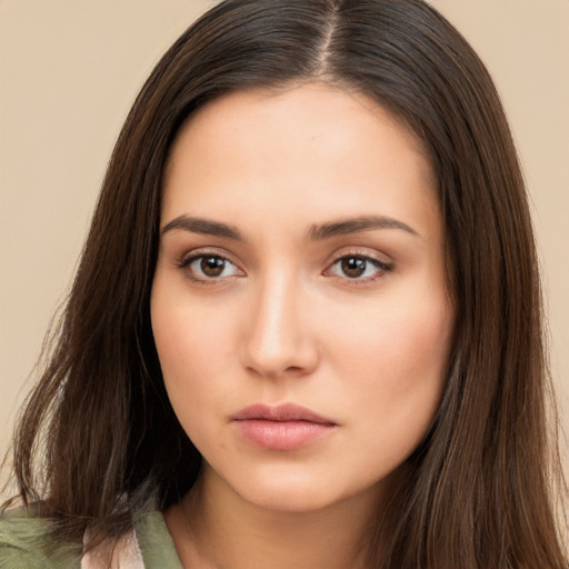 Neutral white young-adult female with long  brown hair and brown eyes