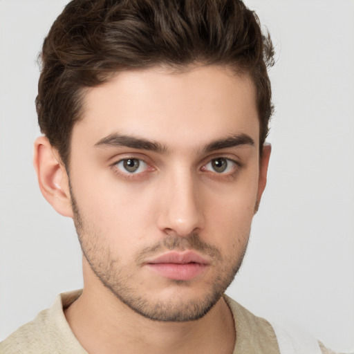 Neutral white young-adult male with short  brown hair and brown eyes