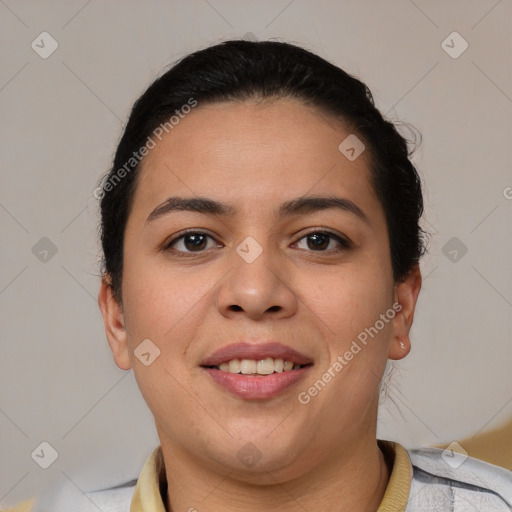 Joyful latino young-adult female with short  brown hair and brown eyes