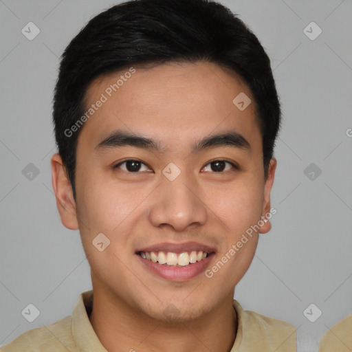 Joyful asian young-adult male with short  black hair and brown eyes