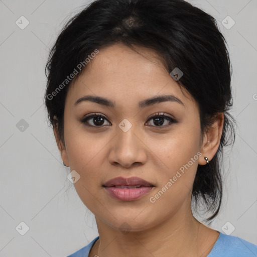 Joyful latino young-adult female with medium  black hair and brown eyes