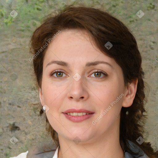 Joyful white young-adult female with medium  brown hair and green eyes