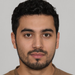 Neutral latino young-adult male with short  black hair and brown eyes