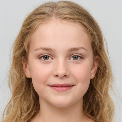 Joyful white child female with medium  brown hair and grey eyes