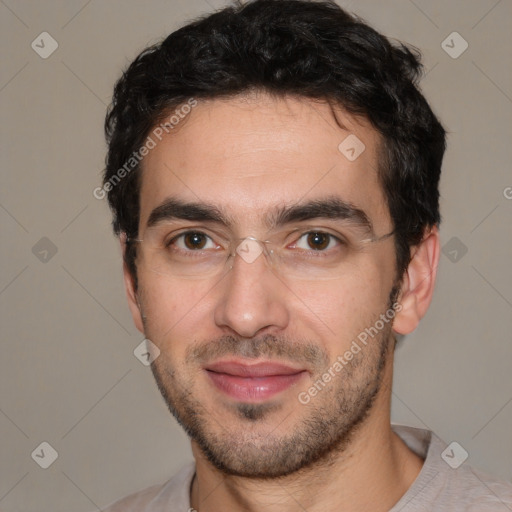 Joyful white young-adult male with short  black hair and brown eyes