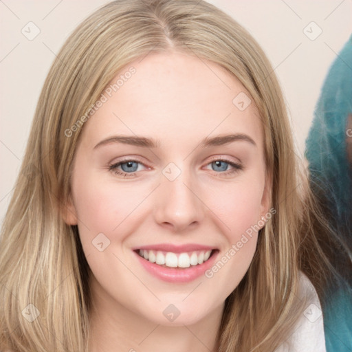 Joyful white young-adult female with long  brown hair and blue eyes