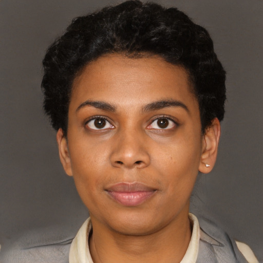 Neutral black young-adult female with short  black hair and brown eyes