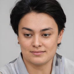 Joyful asian young-adult female with medium  brown hair and brown eyes