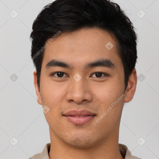 Joyful latino young-adult male with short  brown hair and brown eyes