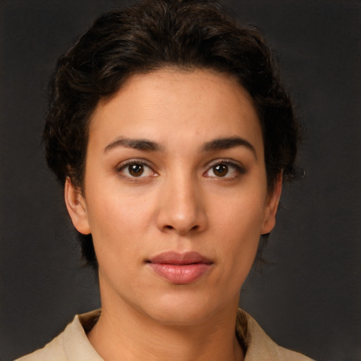 Neutral white young-adult female with short  brown hair and brown eyes