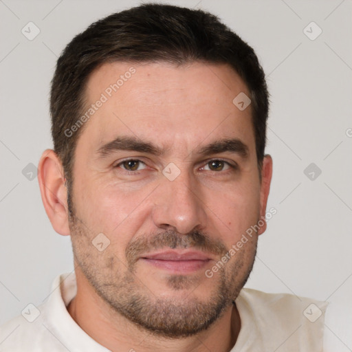 Joyful white adult male with short  brown hair and brown eyes