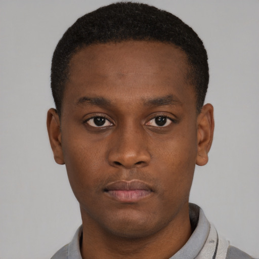 Neutral black young-adult male with short  brown hair and brown eyes