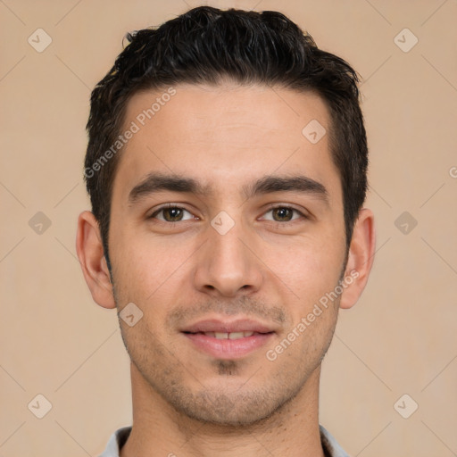 Joyful white young-adult male with short  black hair and brown eyes