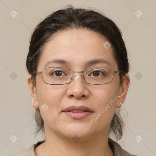 Joyful white adult female with short  brown hair and brown eyes