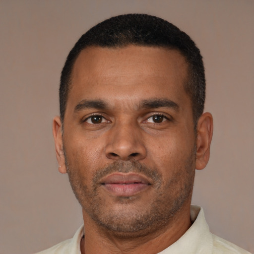 Neutral latino adult male with short  black hair and brown eyes