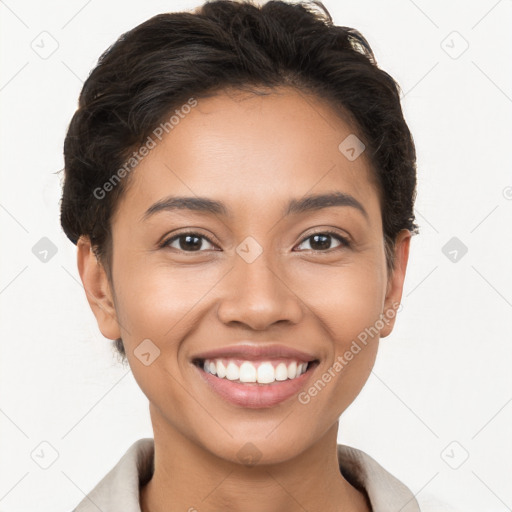 Joyful latino young-adult female with short  brown hair and brown eyes