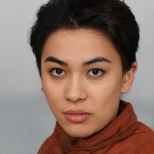 Neutral latino young-adult female with short  brown hair and brown eyes