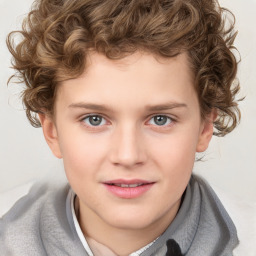 Joyful white child male with short  brown hair and brown eyes