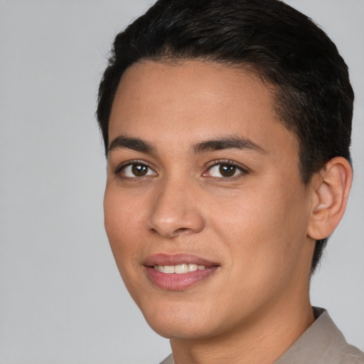 Joyful white young-adult female with short  black hair and brown eyes