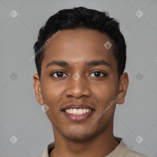 Joyful black young-adult male with short  black hair and brown eyes