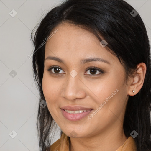 Joyful white young-adult female with long  brown hair and brown eyes